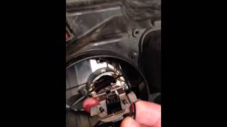 How to Remove the light bulb holder from Astra H headlights [upl. by Glass]