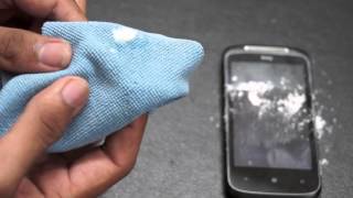 How to Remove Scratches from your Smartphones Screen [upl. by Yumuk19]