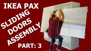 IKEA PAX WARDROBE sliding doors assembly PART 3 [upl. by Yasmine481]