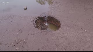 Sinkhole drains lake at Lone Elk Park [upl. by Arabel]