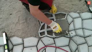 How to lay concrete pavers using a mold [upl. by Eglantine380]