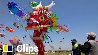 China’s annual kite festival takes off with 280metrelong ‘dragon’ in the sky [upl. by Anahsirk474]