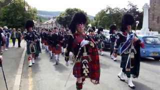 Scottish Bagpipe Band marching through Ballater August 2012 [upl. by Erehpotsirhc111]