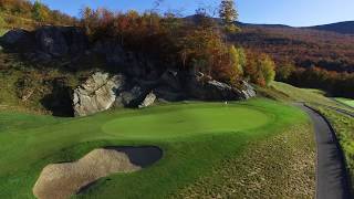 Hole 1  The Mountain Course at Spruce Peak [upl. by Eenwahs]